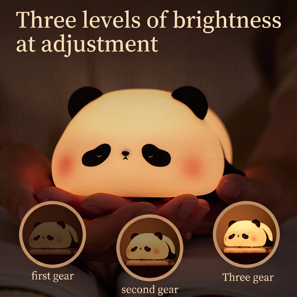 Panda LED night light held in hands showing three brightness levels — first gear, second gear, and three gear