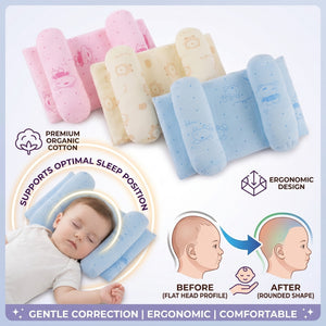 Dukaano baby positioning pillow laid out on a bed